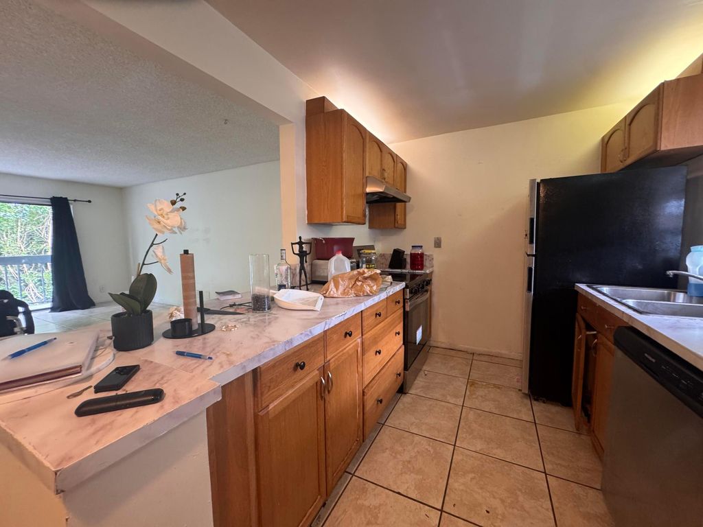 Photo of 2050 N Congress Avenue #207, West Palm Beach, FL 33401 (MLS # B26037822)