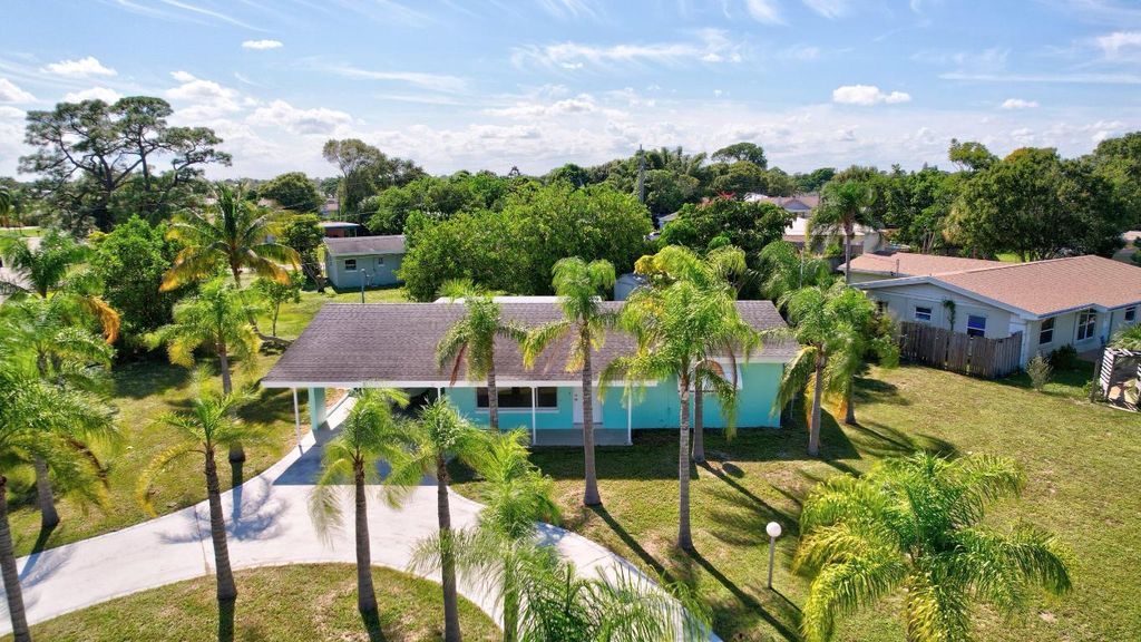 Photo of 210 Beach Avenue, Port Saint Lucie, FL 34952 (MLS # R10917215)