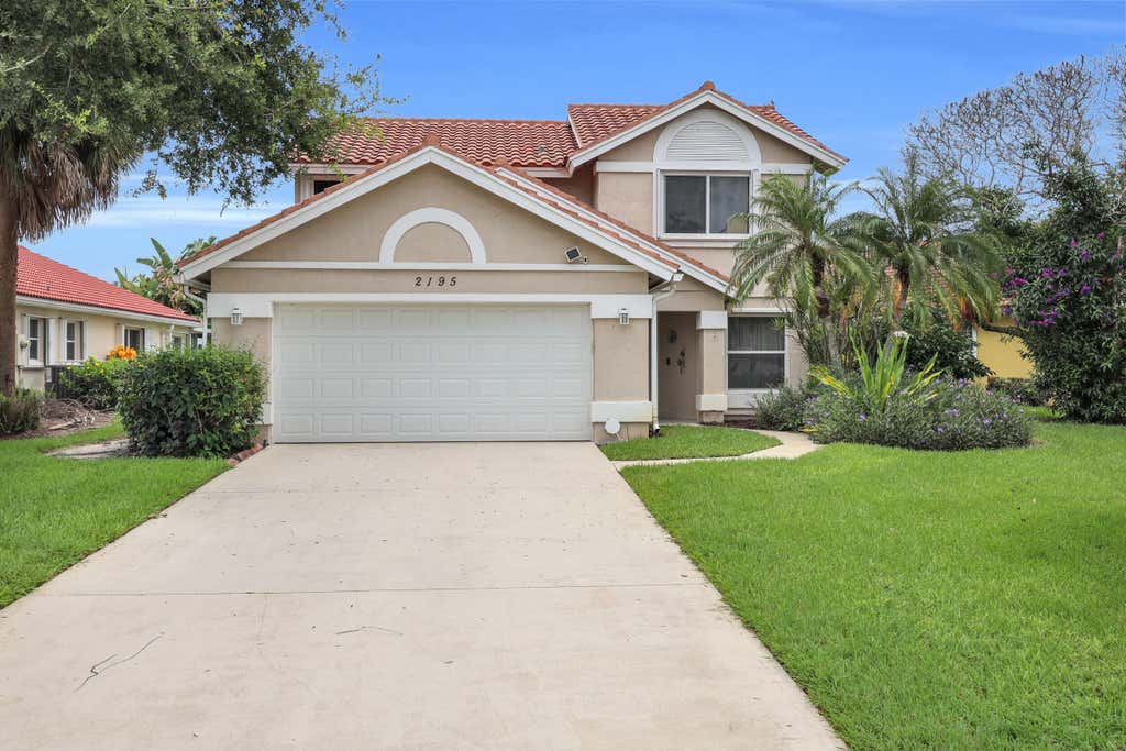 Photo of 2195 SW Shoal Creek Trace, Palm City, FL 34990 (MLS # B26057985)