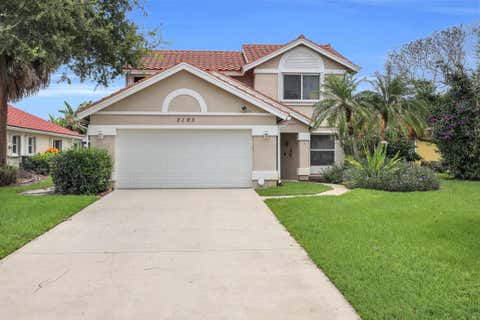 Photo of 2195 SW Shoal Creek Trace, Palm City, FL 34990 (MLS # B26057985)