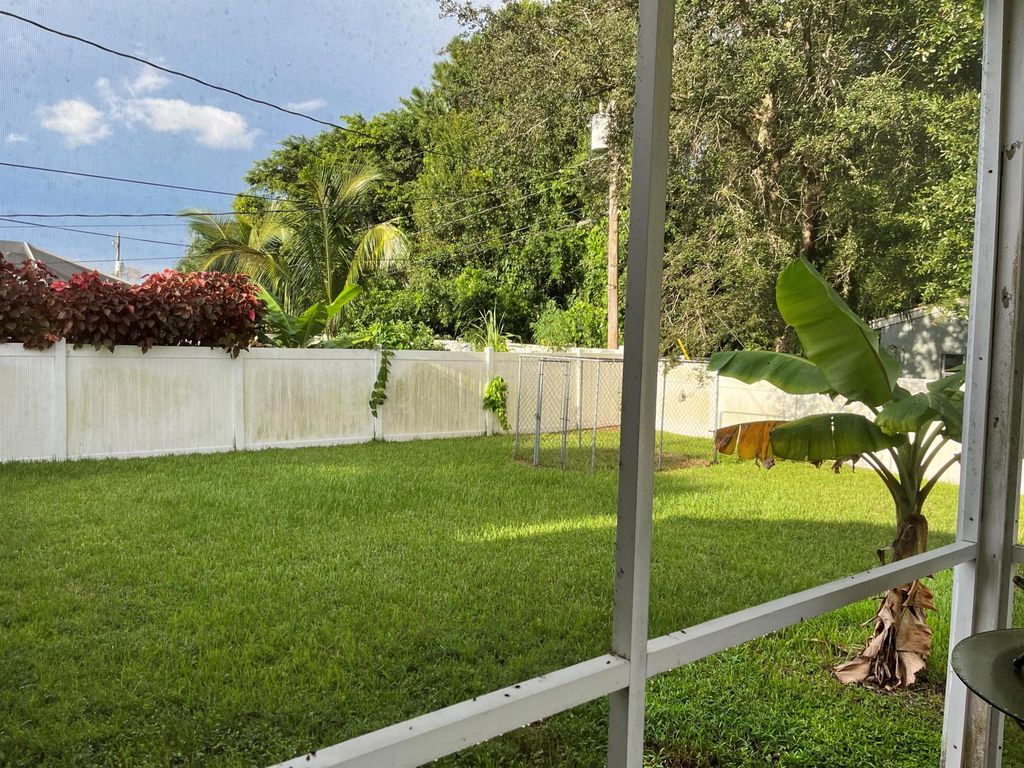 Photo of 1997 SW Davis Street, Port St Lucie, FL 34953 (MLS # R10916054)
