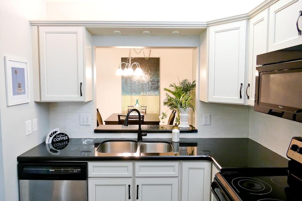 Photo of 6468 Chasewood Drive #D, Jupiter, FL 33458 (MLS # R11109783)