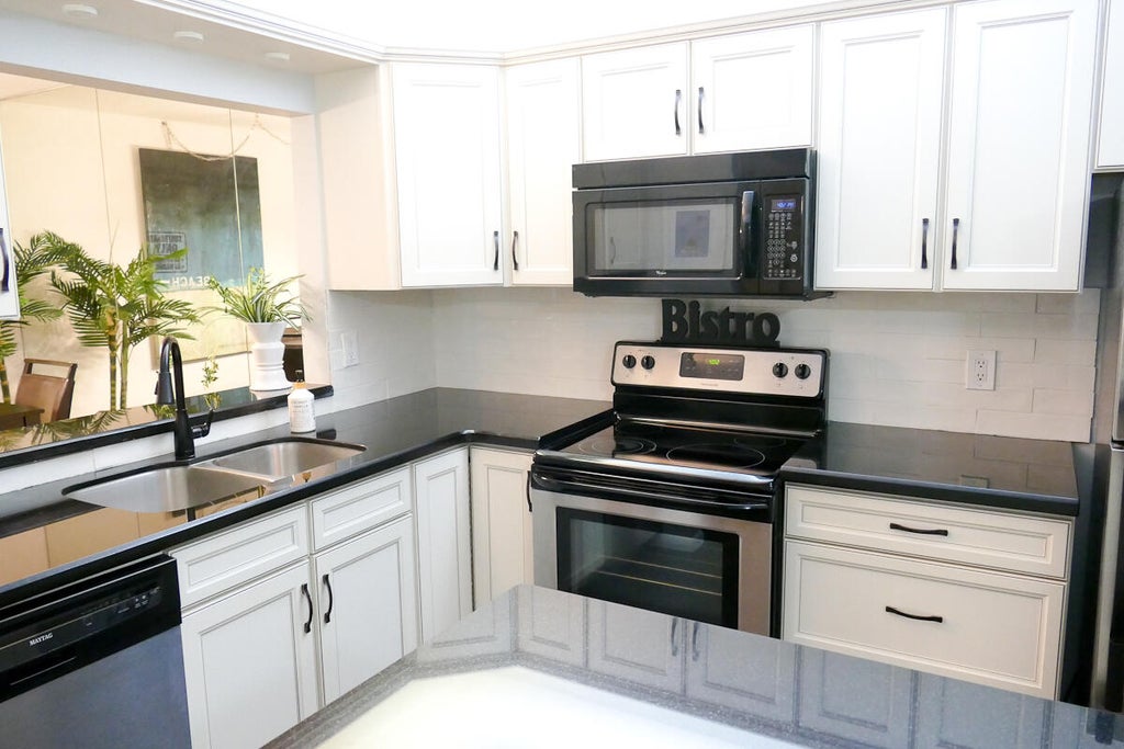 Photo of 6468 Chasewood Drive #D, Jupiter, FL 33458 (MLS # R11109783)