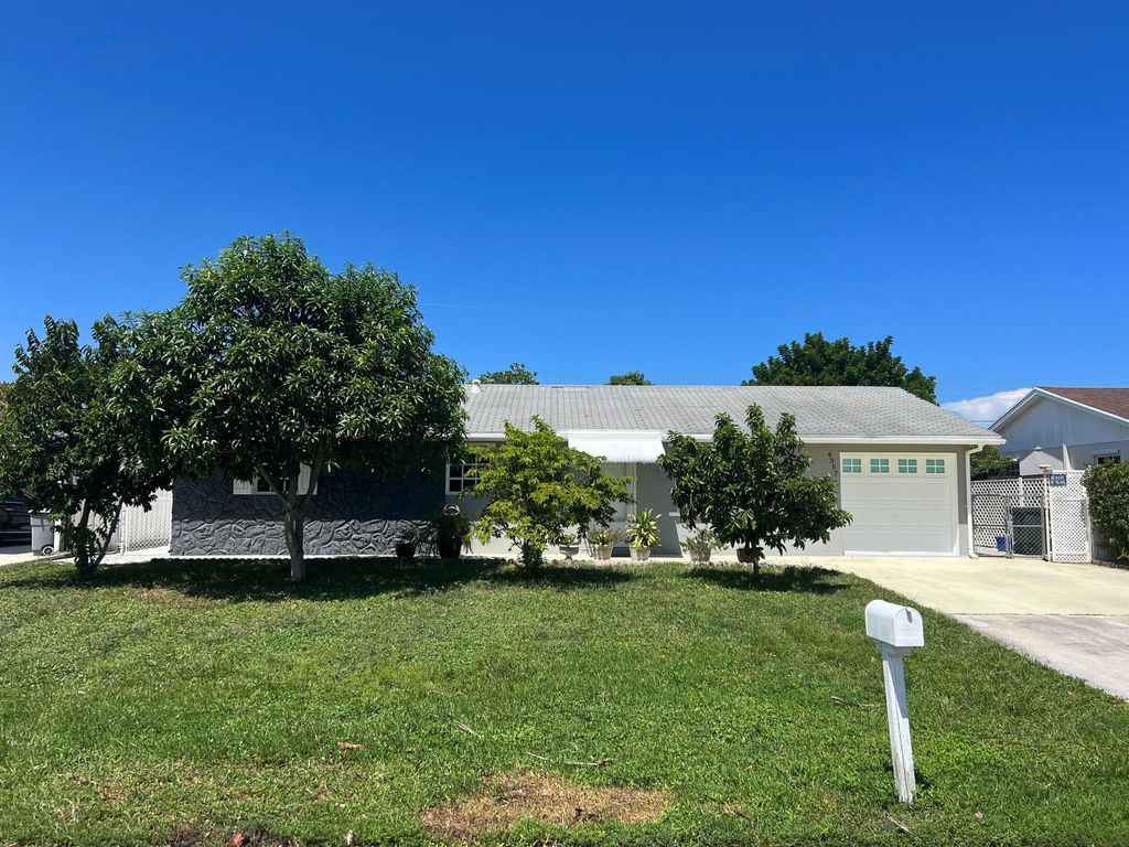 Photo of 4357 Applecrest Drive, Palm Beach Gardens, FL 33410 (MLS # R10920271)