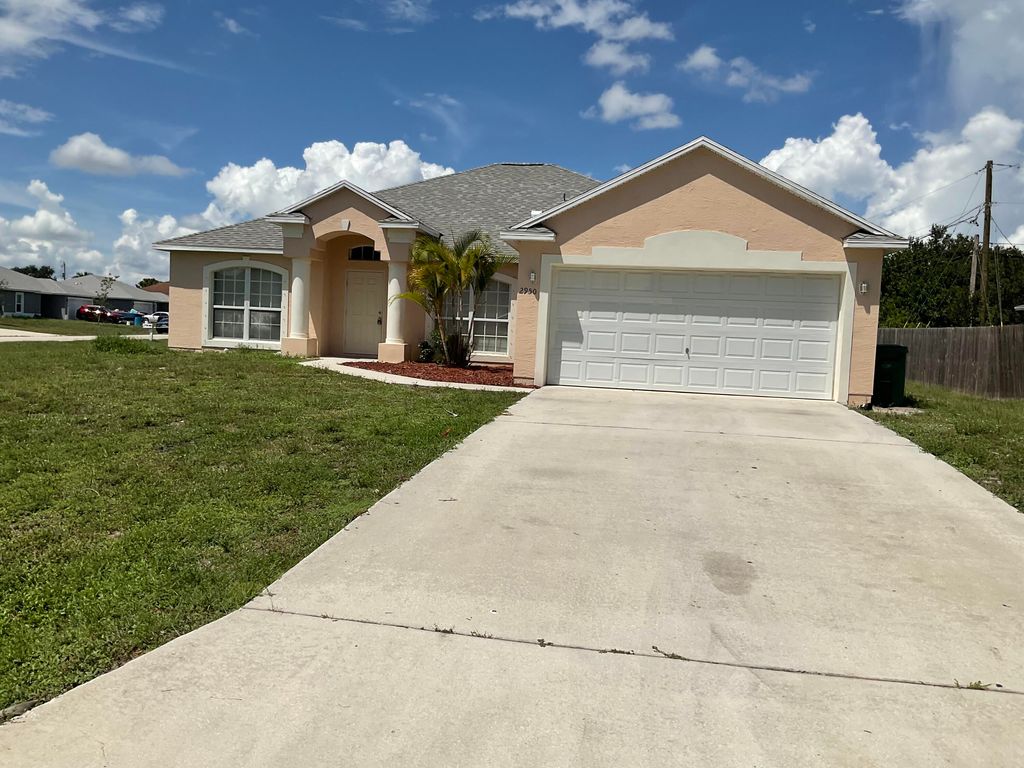 Photo of 2950 SW Sterling Street St, Port St Lucie, FL 34953 (MLS # R10826590)