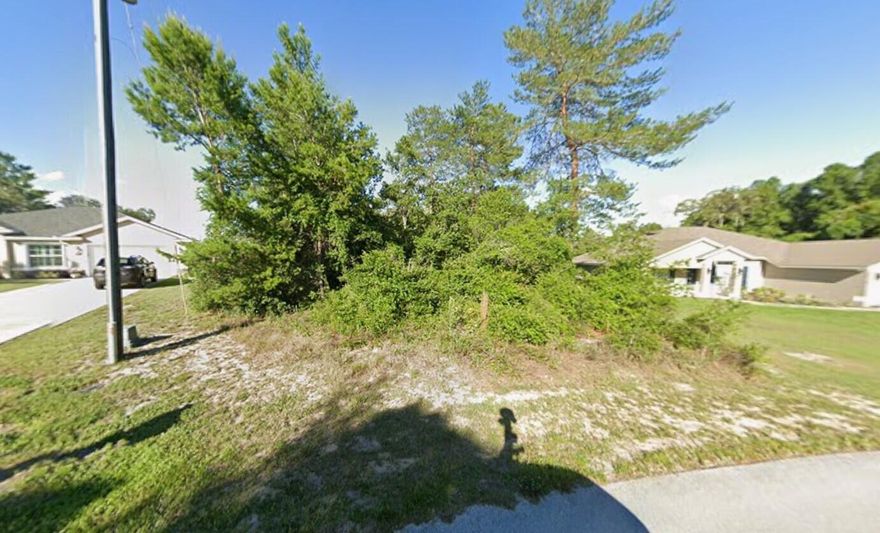 Discover this 0.48-acre vacant lot on SW 39th Terrace in the growing community of Ocala. This property offers a great opportunity to build your future home or invest in land within a rapidly developing area. Enjoy the convenience of nearby shopping, dining, and schools, while still having the peace and privacy of a residential neighborhood. No HOA and no time limit to build. Don't miss out on this affordable piece of Florida living. For directional purposes use the neighbor address 9938 SW 39th Terr