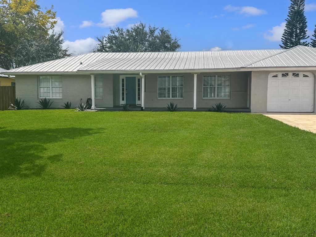 Photo of 5205 Feather Creek Drive, Fort Pierce, FL 34951 (MLS # R11127443)