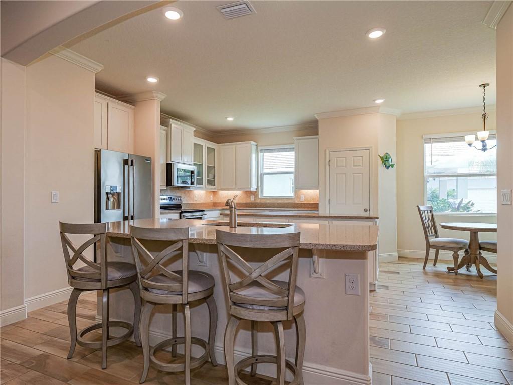 Season/Off-season rental now available in The Antilles in beautiful Vero Beach, FL! This gorgeous 3 bed+3 bath+3 car garage, turnkey property has all the comforts of home & is awaiting your arrival. Just minutes away from shopping, dining, beaches & more! Spacious open living concept features a beautiful chef's kitchen, large living & dining area, oversized master suite, & screened in patio w/private backyard. Gated community with a plethora of amenities - pool, clubhouse, fitness center, tennis, & more! Pet friendly! Rental price includes all utilities. Book your stay today!