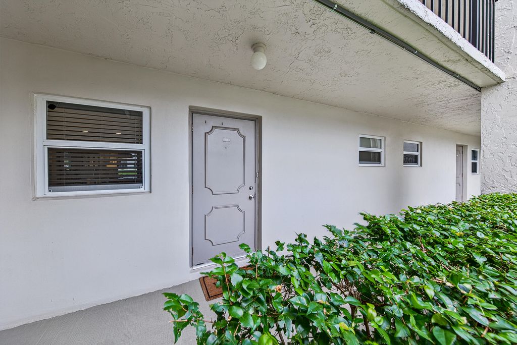 Photo of 9420 Poinciana Place #108, Davie, FL 33324 (MLS # B26044161)