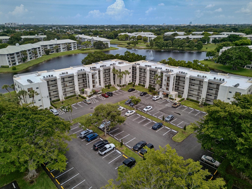 Photo of 9420 Poinciana Place #108, Davie, FL 33324 (MLS # B26044161)