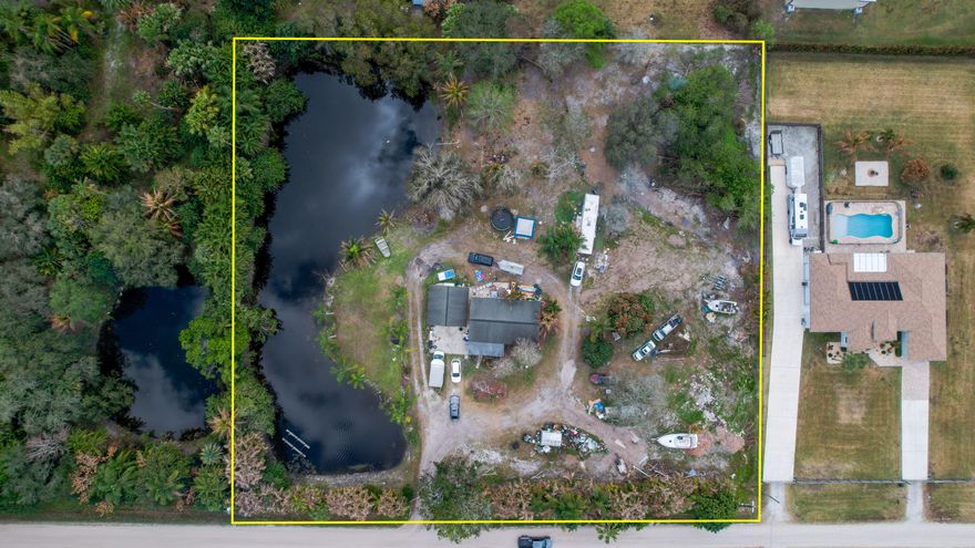 Escape to your own private retreat with this charming home nestled on 2.5 picturesque acres complete with a serene pond. Surrounded by nature, this property offers the perfect blend of peaceful country living and everyday comfort. Inside, natural light fills the living spaces, creating a bright and welcoming atmosphere throughout. Step outside and enjoy the beauty of your expansive property. The tranquil pond provides a scenic focal point and the perfect spot to relax, fish, or unwind at the end of the day. With Plenty of room for gardening, outdoor entertaining, recreational activities, or simply enjoying the privacy and quiet surroundings. Whether you're looking for a full-time residence, weekend getaway, or investment opportunity, this unique property offers endless possibilities!