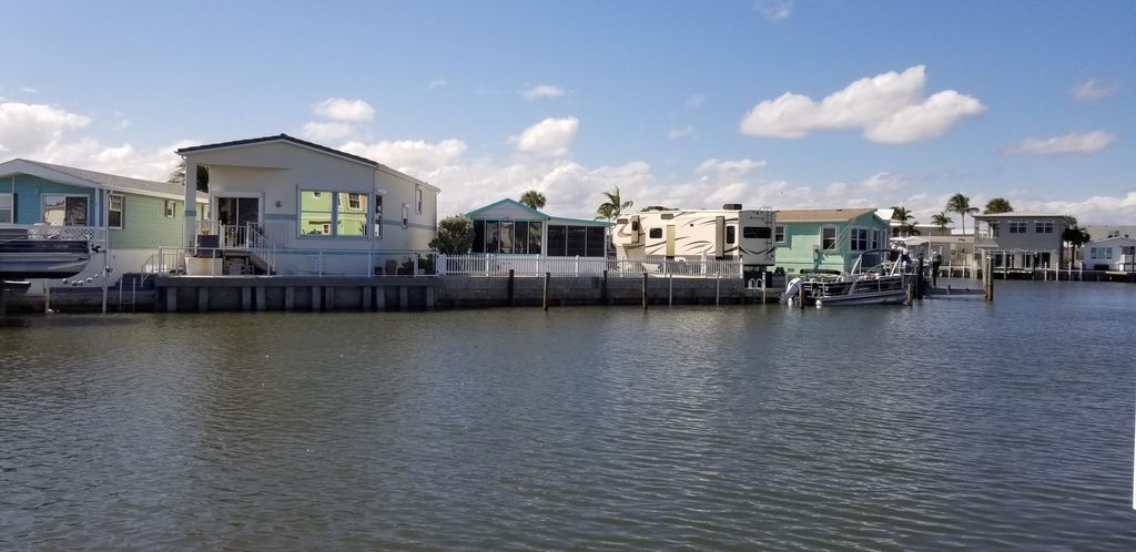 Photo of 10701 S Ocean Drive, Jensen Beach, FL 34957 (MLS # B26005106)