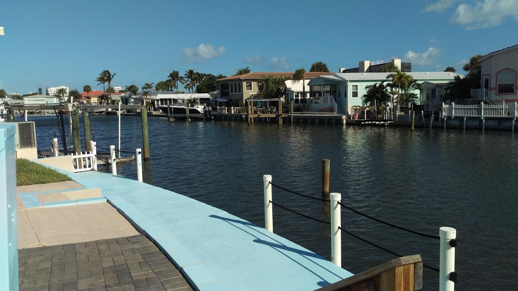 Photo of 10701 S Ocean Drive, Jensen Beach, FL 34957 (MLS # B26005106)