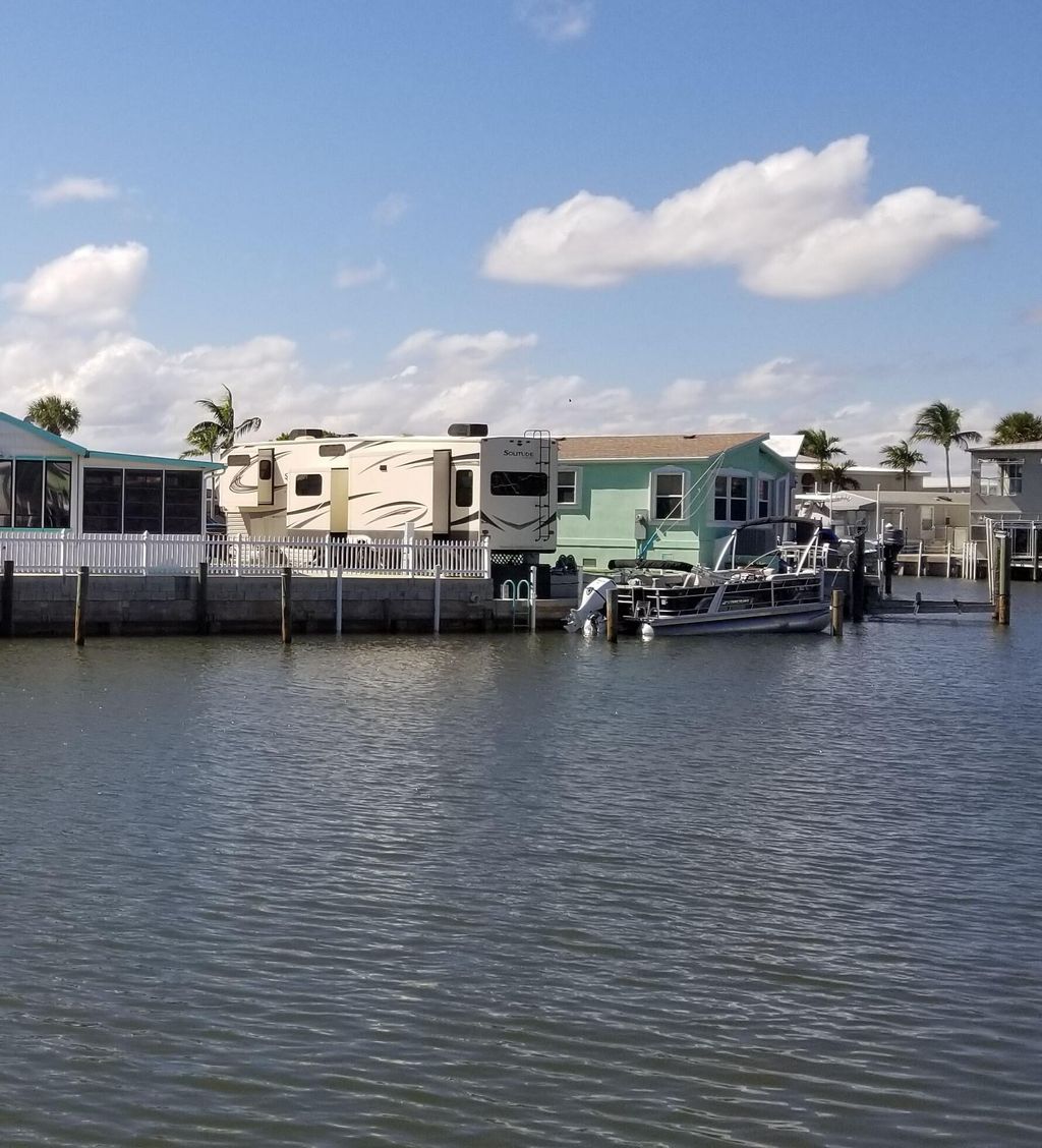 Photo of 10701 S Ocean Drive, Jensen Beach, FL 34957 (MLS # B26005106)