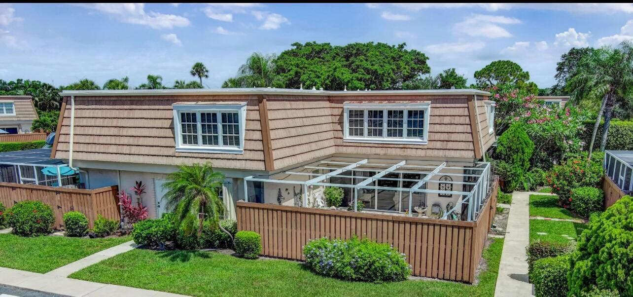 This 3-bedroom, 2.5-bathroom townhouse is situated in a desirable and tranquil location. This private unit features an expansive patio, ideal for hosting gatherings or unwinding in peaceful solitude. The spacious downstairs living area enhances everyday living and entertaining, while the bedrooms offer generous space. The master suite has scenic views of lush greenery and private common areas, framed by elegant double doors. Positioned on the community's quiet outer bank, the home offers the ambiance of a single-family residence with easy access to key amenities such as I-95, Publix, excellent dining, and is just a short drive from the beach and the vibrant lifestyle of Palm Beach Gardens.