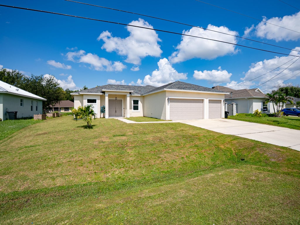 Photo of 2366 SW Blaine Terrace, Port Saint Lucie, FL 34953 (MLS # B26066246)