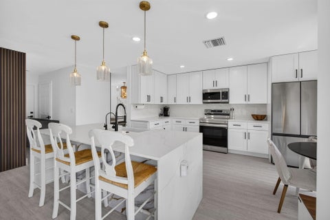 Tiny photo for 1043 Aspri Way, Riviera Beach, FL 33418 (MLS # B26089113)