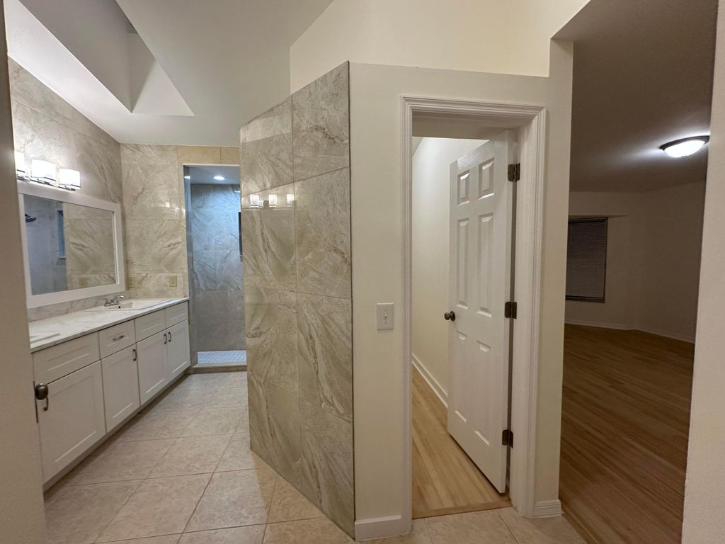 Photo of 914 SW Cecil Lane, Port Saint Lucie, FL 34953 (MLS # R11160119)