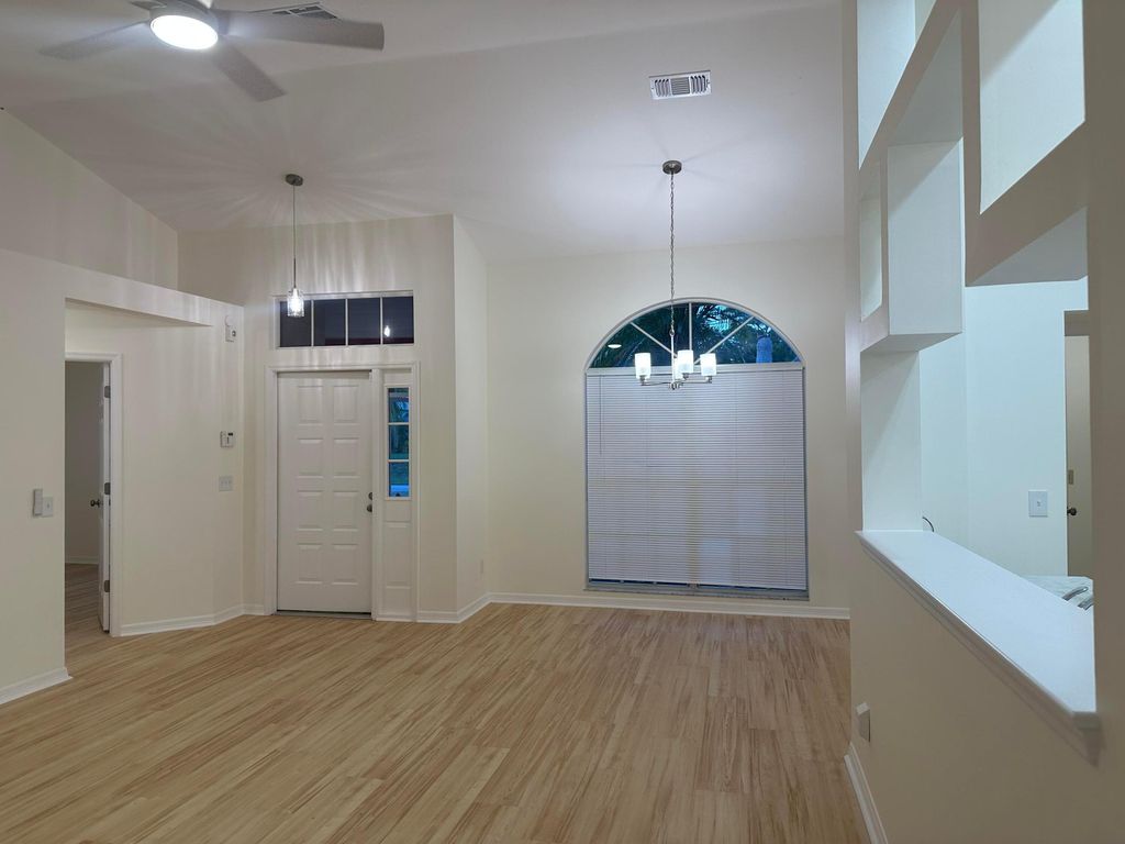 Photo of 914 SW Cecil Lane, Port Saint Lucie, FL 34953 (MLS # R11160119)