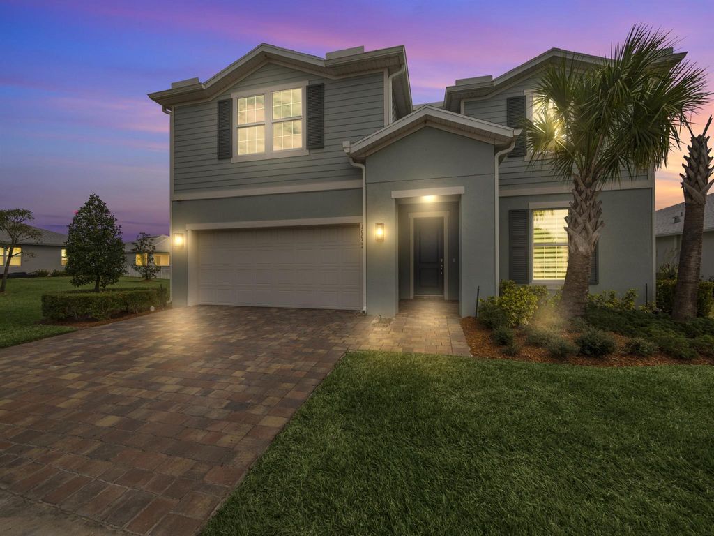 Photo of 10052 SW Captiva Drive, Port Saint Lucie, FL 34987 (MLS # R10966148)