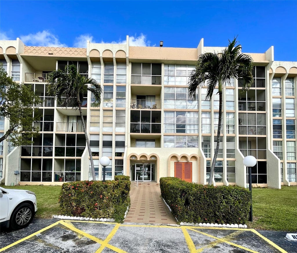 Photo of 801 THREE ISLANDS Boulevard #214, Hallandale Beach, FL 33009 (MLS # B26060363)