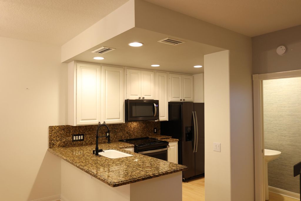 Photo of 80 Live Oak Circle, Tequesta, FL 33469 (MLS # B26010225)