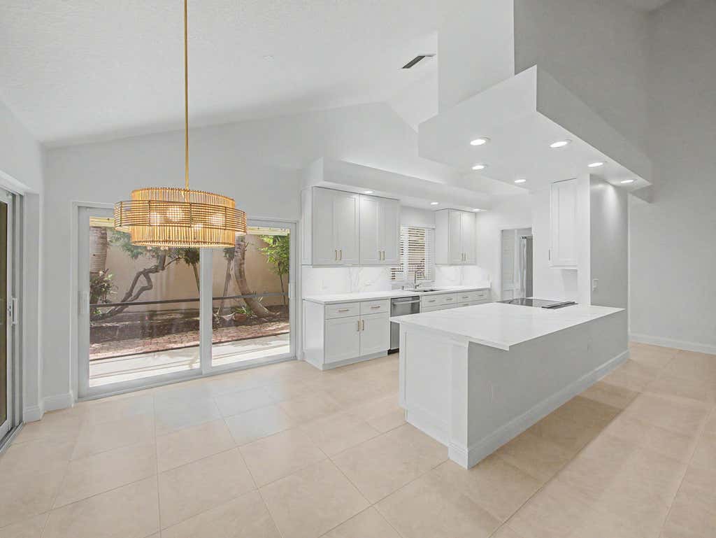 Photo of 303 LEEWARD Drive, Jupiter, FL 33477 (MLS # B26060418)