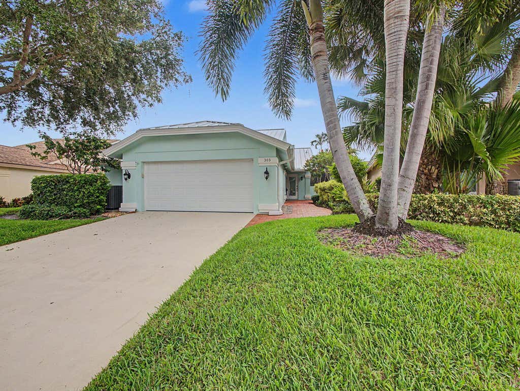 Photo of 303 LEEWARD Drive, Jupiter, FL 33477 (MLS # B26060418)
