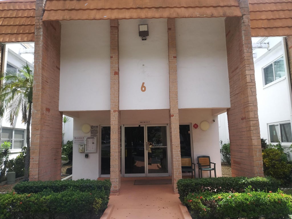 Photo of 4841 NW 22nd Court #215, Lauderhill, FL 33313 (MLS # B26080563)