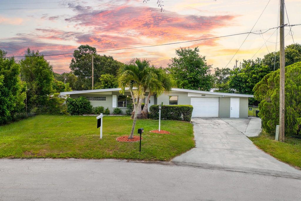 Photo of 1935 E Esplanade Ave, Fort Pierce, FL 34982 (MLS # R10903387)