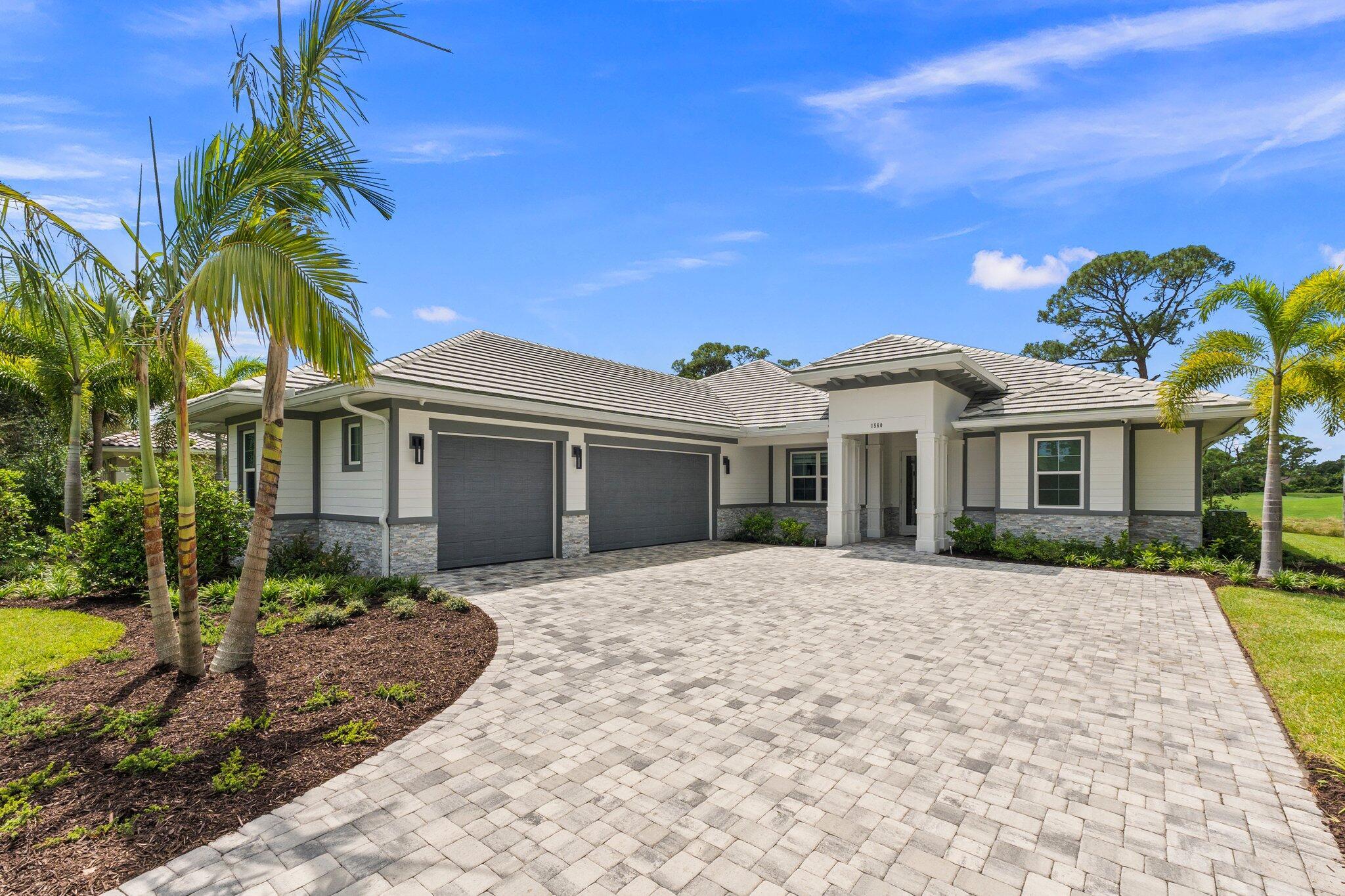 Welcome to this brand-new luxury home on the first hole of the Cape Club, where every detail blends elegance with comfort. Wide-plank wood floors lead you through open living spaces with coffered ceilings and crown molding, while natural light pours in through impact windows, framing serene golf course views.The chef's kitchen offers Bosch appliances, quartz countertops, and soft-close cabinetry -- the perfect setting for both quiet mornings and lively gatherings. The owner's suite is a private retreat with its own climate control, custom closets, and a spa-like bath featuring a soaking tub and separate shower.Step outside to your half-acre lot and take in the