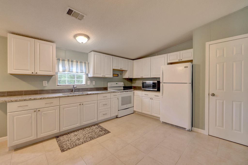 Photo of 7623 SW 40th Terrace, Palm City, FL 34990 (MLS # R10805537)