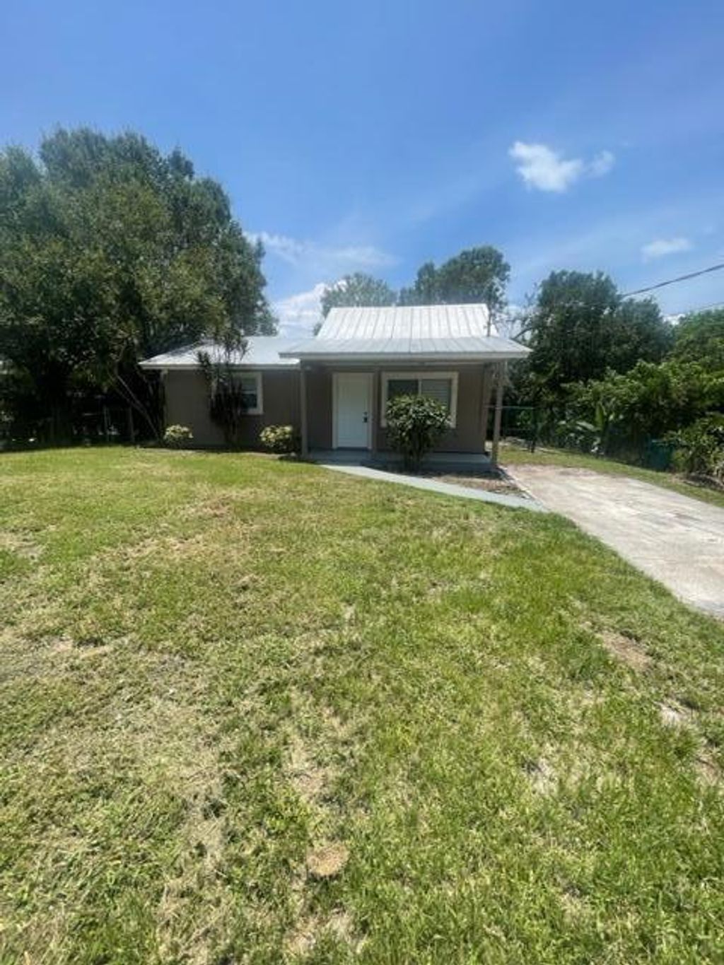 Photo of 377 Baysinger Avenue, Fort Pierce, FL 34982 (MLS # R10897412)