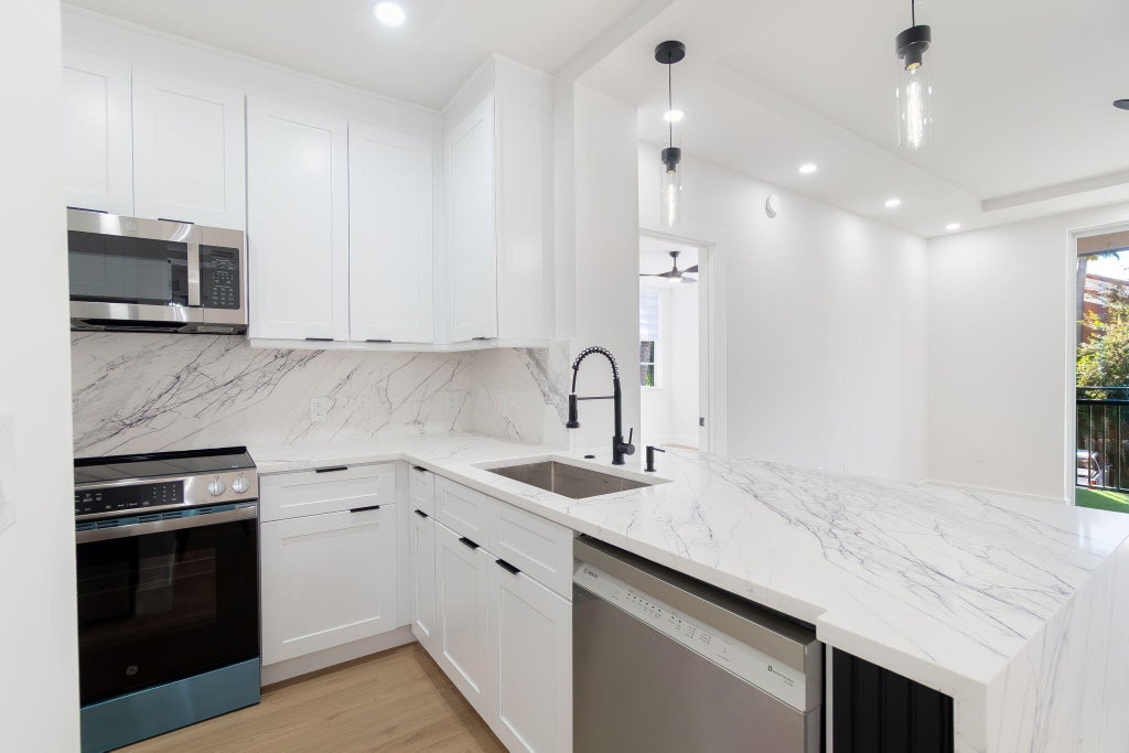 Photo of 11770 Saint Andrews Place #206, Wellington, FL 33414 (MLS # B26092506)