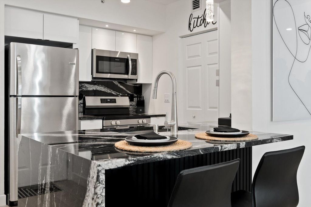 Photo of 600 S Dixie Highway #659, West Palm Beach, FL 33401 (MLS # B26025617)