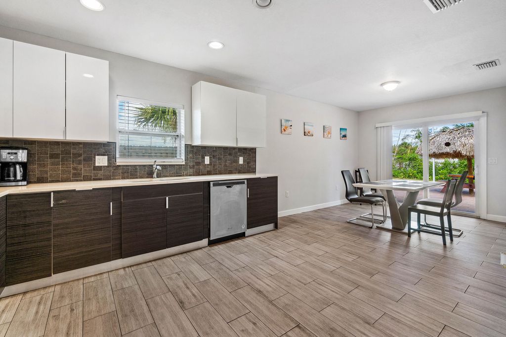 Photo of 749 Tallapoosa Street, West Palm Beach, FL 33405 (MLS # B26009633)