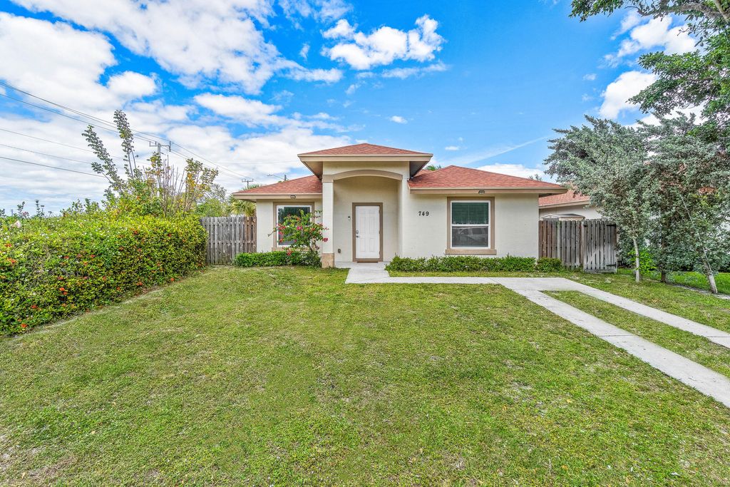 Photo of 749 Tallapoosa Street, West Palm Beach, FL 33405 (MLS # B26009633)