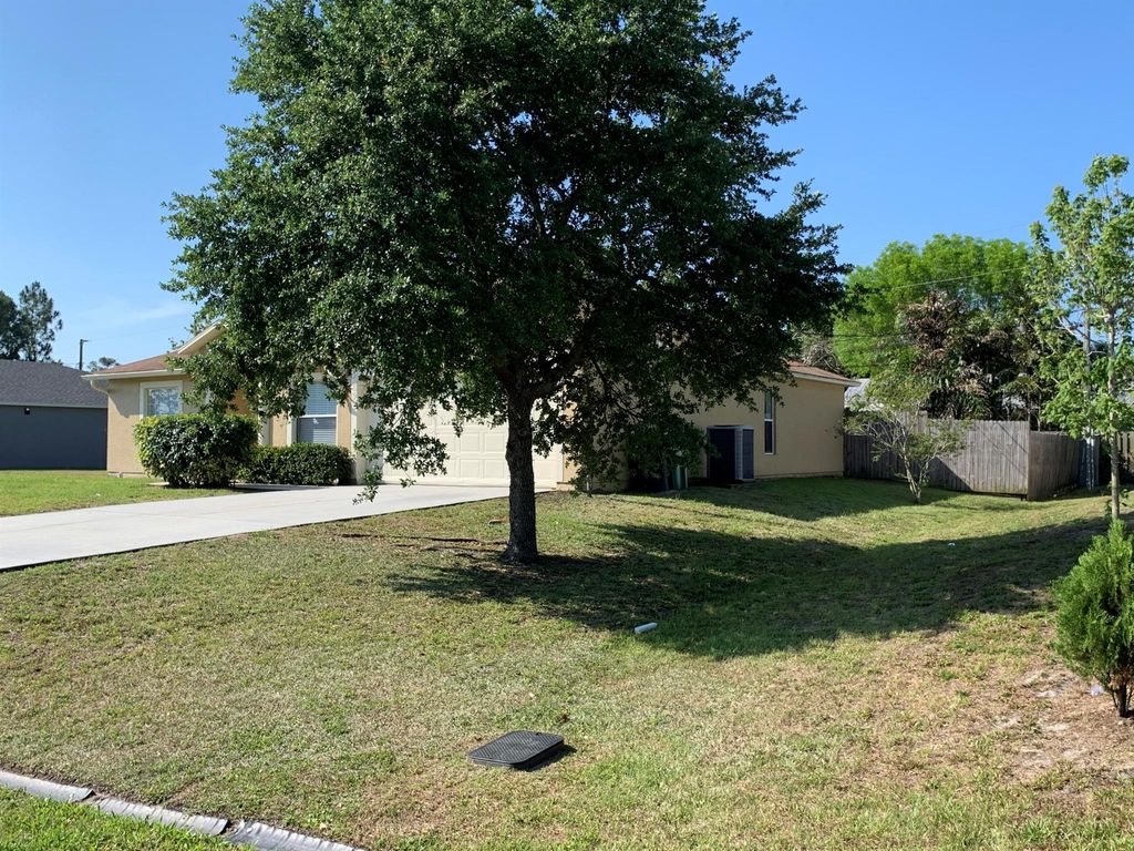 Photo of 269 SW Ridgecrest Drive, Port Saint Lucie, FL 34953 (MLS # R11086591)