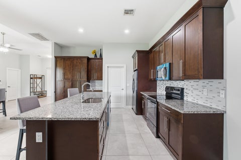 Tiny photo for 296 SW MILLARD Drive, Port Saint Lucie, FL 34953 (MLS # B26090596)