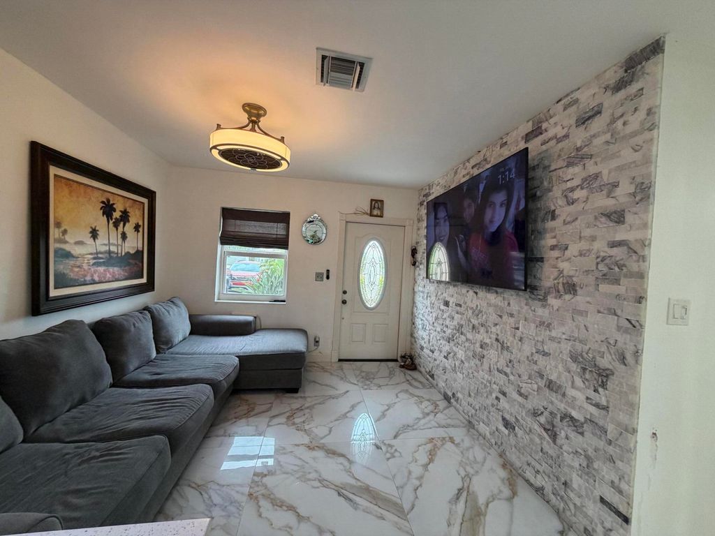 Photo of 1313 S B Street, Lake Worth Beach, FL 33460 (MLS # R11159655)