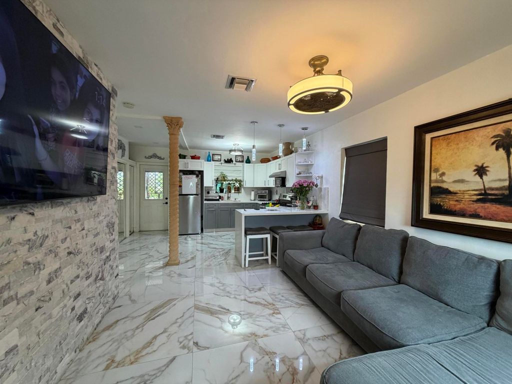 Photo of 1313 S B Street, Lake Worth Beach, FL 33460 (MLS # R11159655)