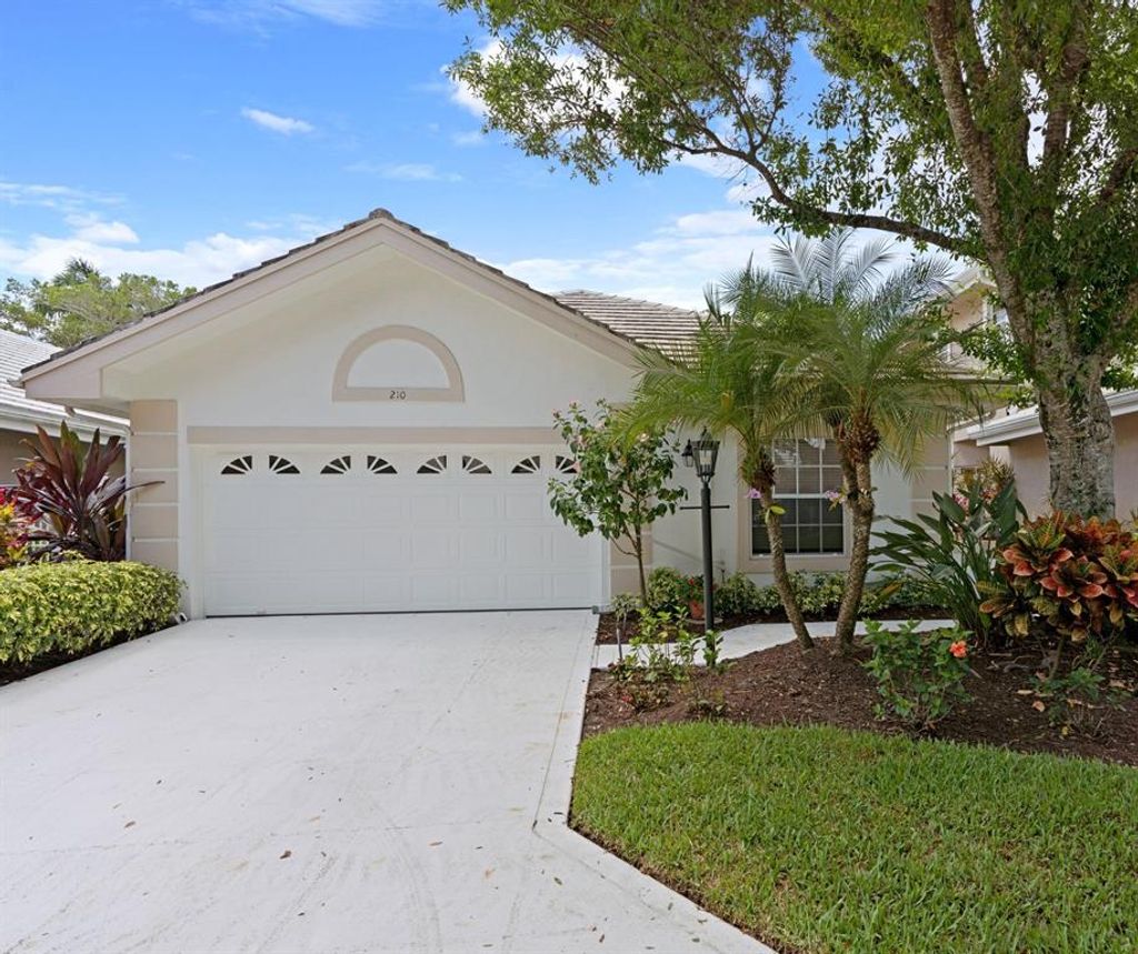Photo of 210 Canterbury Drive W, Palm Beach Gardens, FL 33418 (MLS # R10714660)