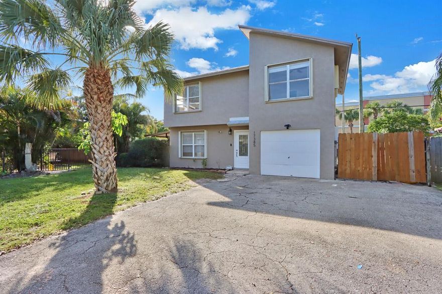 Spectacular 3 bedroom, 2.5 bathroom home featuring a large fenced backyard, 1 car garage, and large living room. 3 Spacious bedrooms upstairs with 2 full baths on the upper level. Full sized washer and dryer included in the lease agreement. Tile flooring on the first floor and wood laminate flooring upstairs. Covered and screened patio area. Great location in Jupiter - less than 10 minutes to the beach! Lawn Care included in the lease​​‌​​​​‌​‌​​​‌‌​​​‌‌‌​​‌​​‌‌​​​​ agreement.