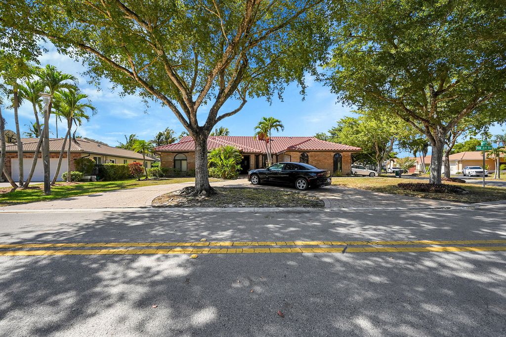 Photo of 5172 NW 84th Road, Pompano Beach, FL 33067 (MLS # R11167019)