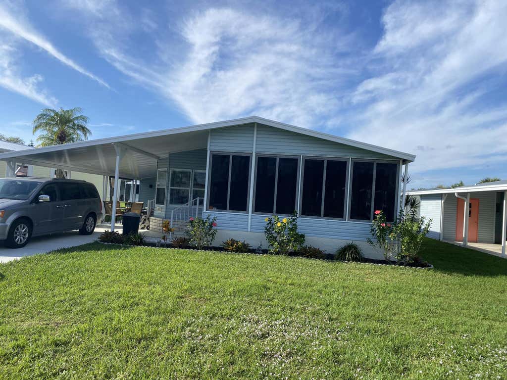 Photo of 6531 Spanish Lakes Boulevard, Fort Pierce, FL 34951 (MLS # R10957447)