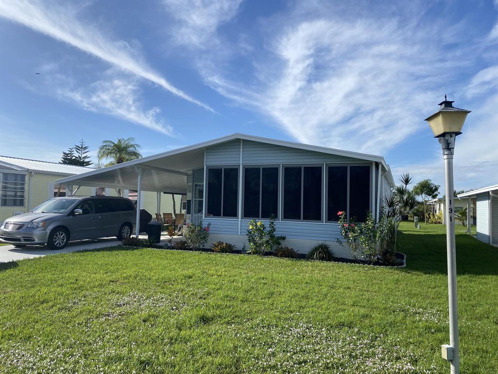 Photo of 6531 Spanish Lakes Boulevard, Fort Pierce, FL 34951 (MLS # R10957447)