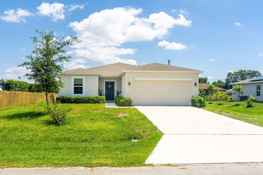 Photo of 362 SW Buswell Avenue, Port Saint Lucie, FL 34983 (MLS # R11093670)