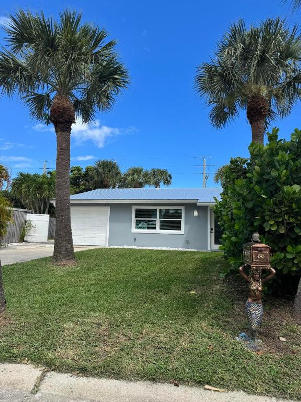Photo of 110 N Las Olas Drive, Jensen Beach, FL 34957 (MLS # R11130760)