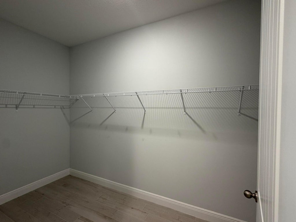 Photo of 2329 SW ALMINAR Street, Port Saint Lucie, FL 34953 (MLS # B26075660)