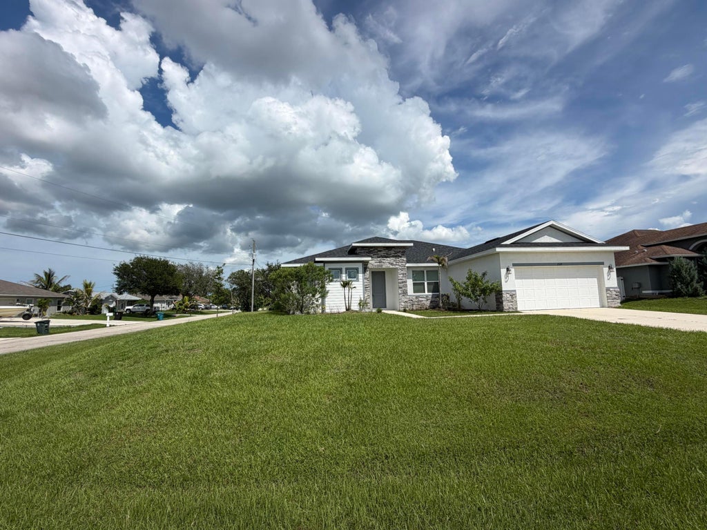 Photo of 2329 SW ALMINAR Street, Port Saint Lucie, FL 34953 (MLS # B26075660)